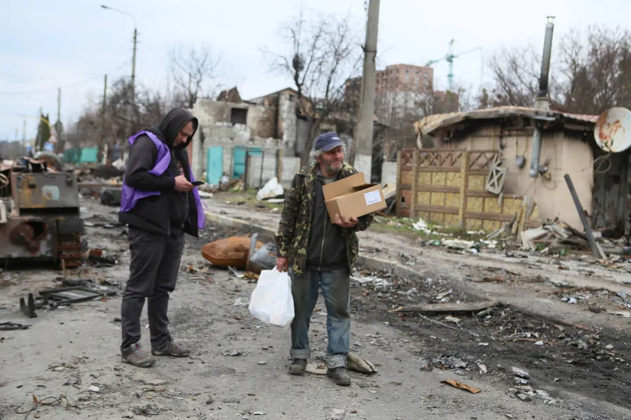 Caritas Spes workers bring aid to people near Kyiv, Ukraine.
