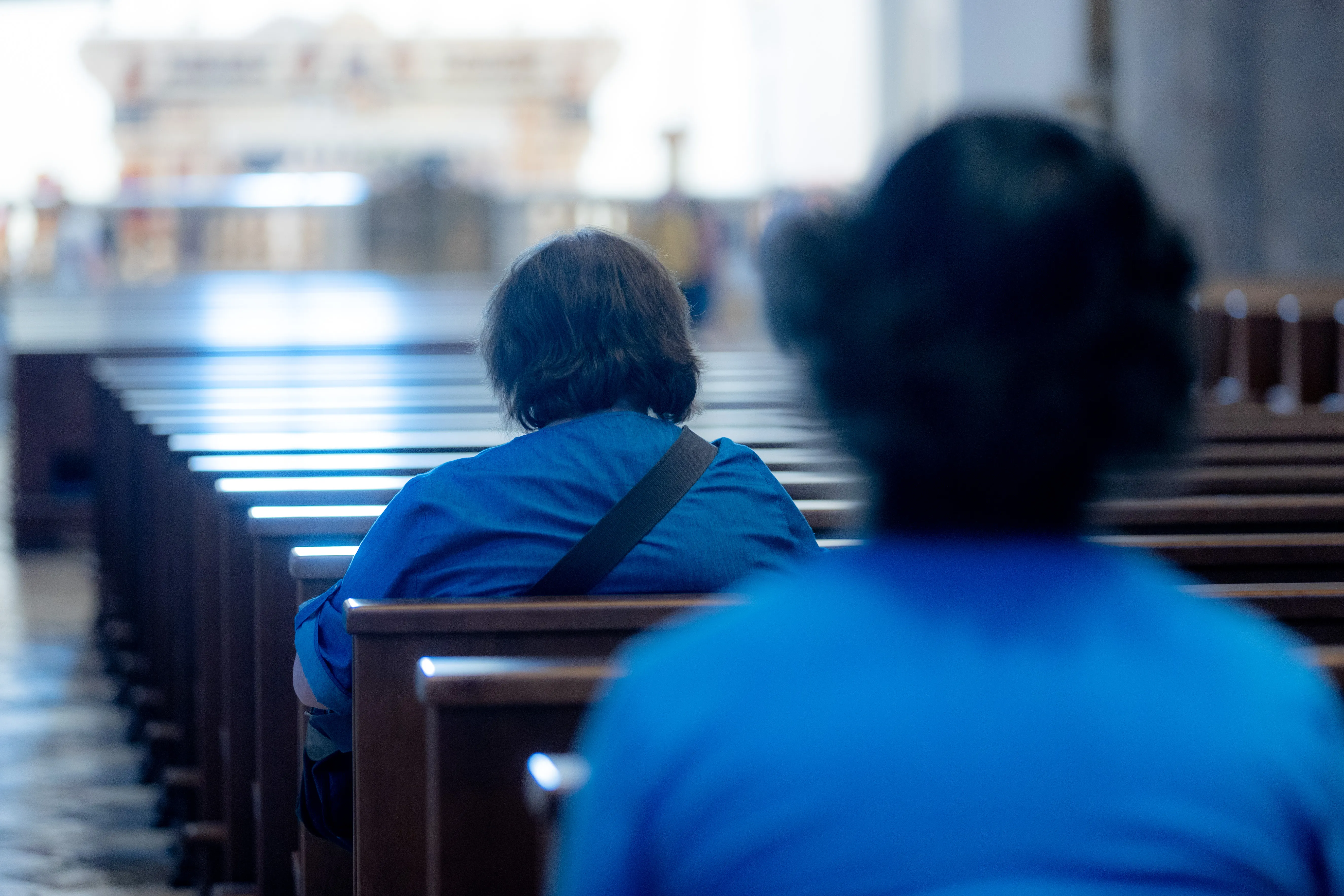 Women are praying in the basilica in L'Aquila in August 2022. Daniel Ibáñez / CNA
