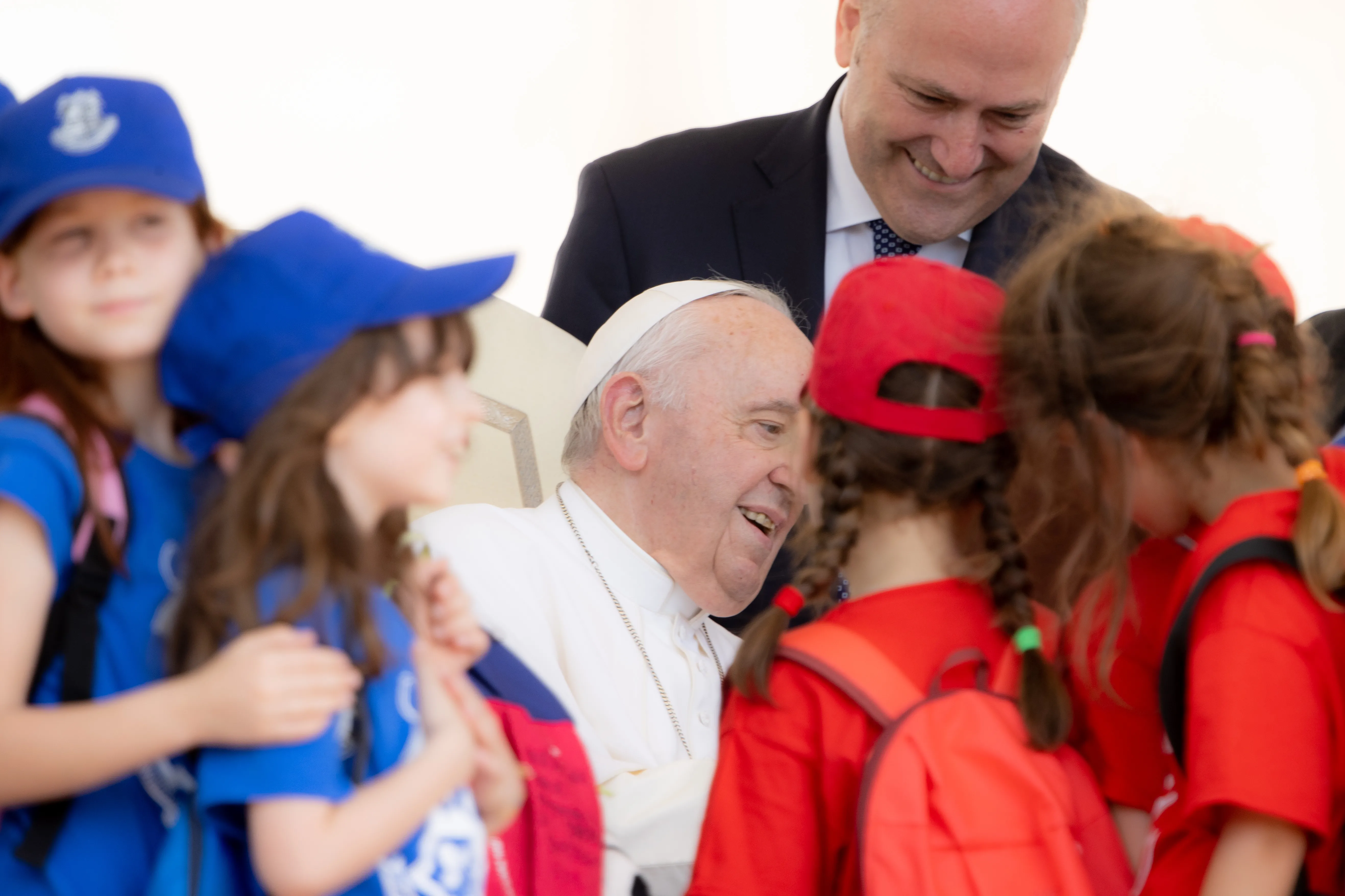 Pope Francis greets children from Ukraine who are studying at a school in Rome. Daniel Ibanez/CNA