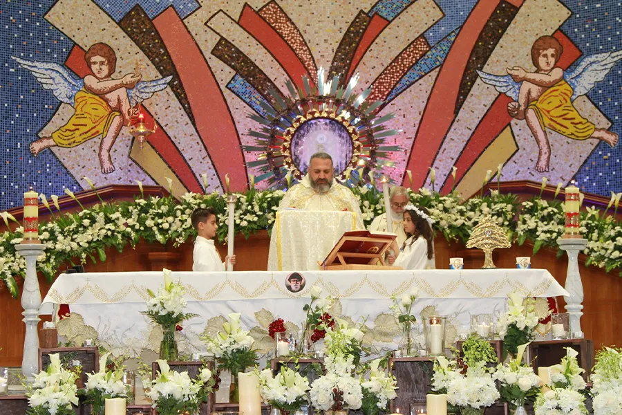 Father Charbel Mhanna celebrating the Divine Liturgy in Our Lady of the Rosary Church, Qatar. Our Lady of the Rosary Church