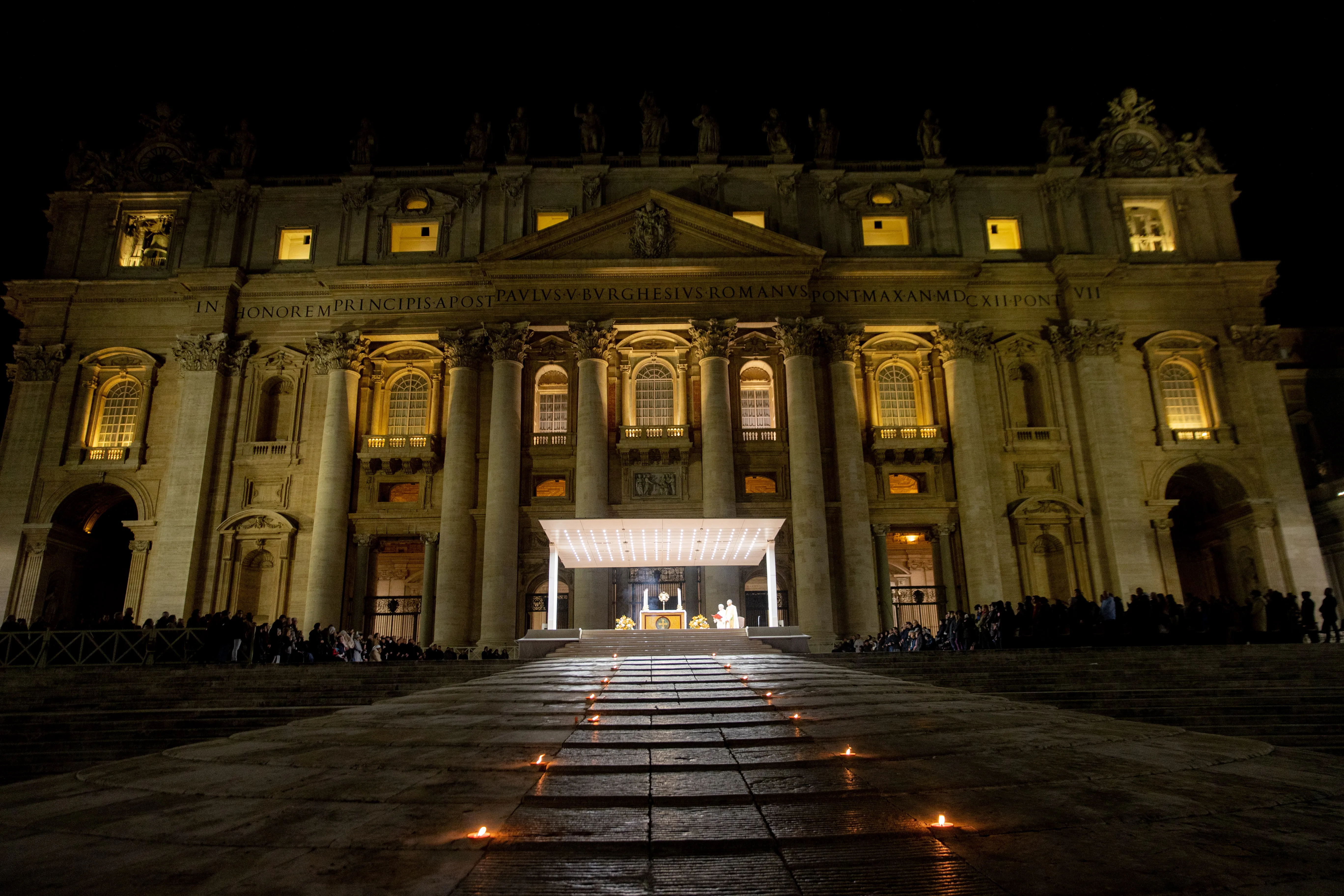 There was a candlelit path to the altar holding the Eucharist during adoration in St. Peter's Square March 14, 2023. Daniel Ibanez/CNA