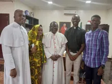 Formerly detained Father Oliver Opara (left) with Ummi Hassan; Bishop Matthew Kukah of the Diocese of Sokoto (not an abductee); Father Stephen Ojapah; and Hassan Fareed Hassan after the four were released from being held captive by terrorists.