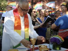 Father Gil Martinez celebrates Mass at the Stonewall National Monument on June 17, 2019.