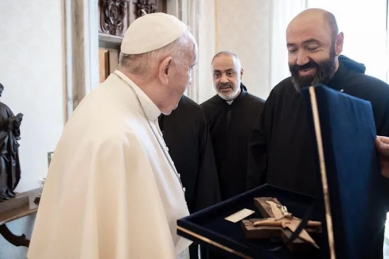 Pope Francis receives crucifix made from wood salvaged after Beirut blast