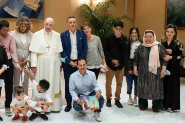 Pope Francis meets with a group of Afghan refugees at the Vatican on Sept. 22, 2021.
