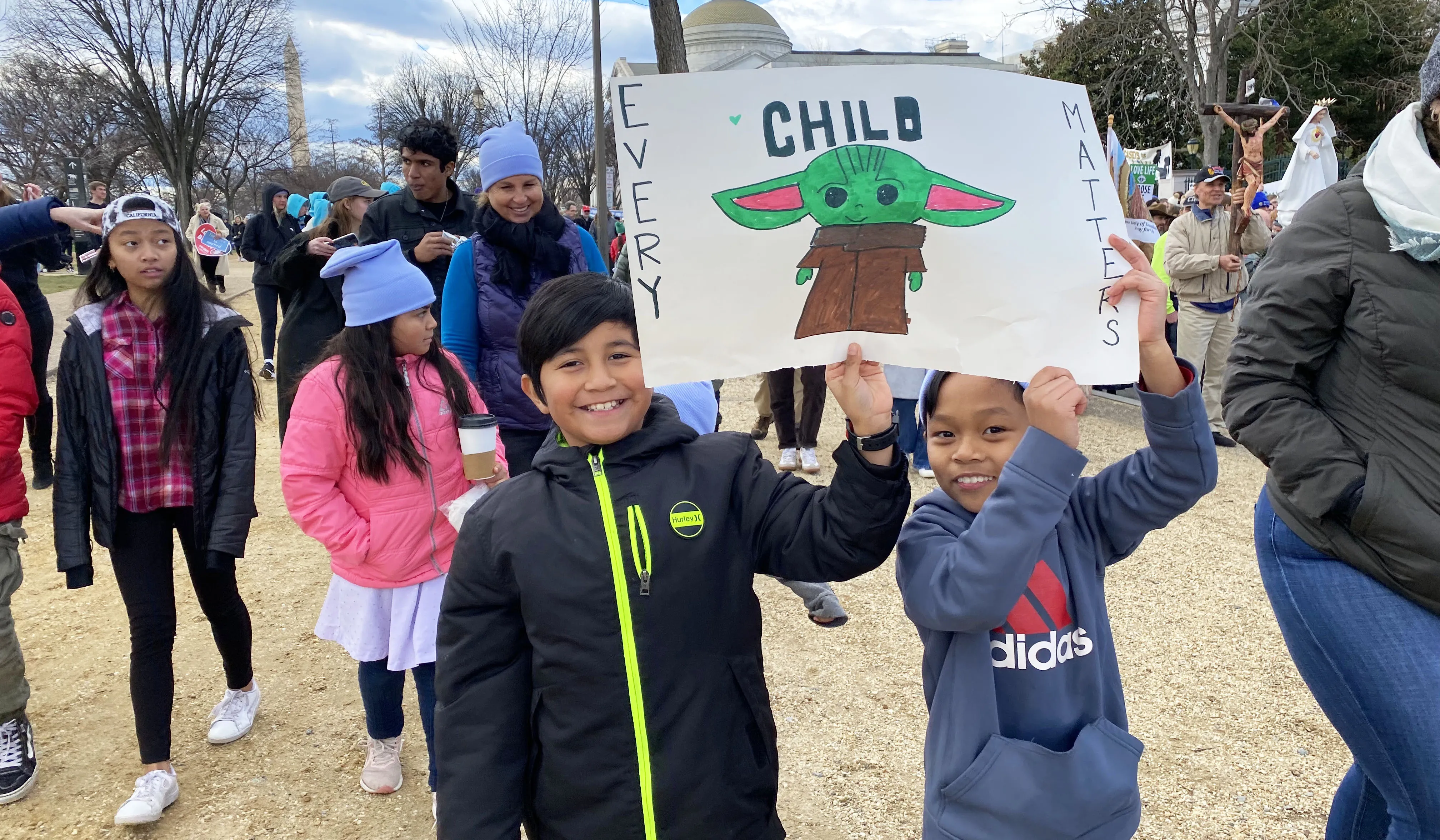 Young pro-life marchers carry Baby Yoda signs at the March for Life in Washington, D.C., on Jan. 20, 2023. Katie Yoder/CNA