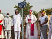 Apostolic Nuncio Archbishop Michael Crotty unveils the new sign of Pope Benedict XVI Street in Burkina Faso’s capital, Ouagadougou.