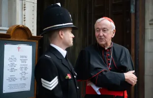 Cardinal Vincent Nichols of Westminster speaks with a police officer outside Westminster Cathedral in London, Nov. 9, 2021. Mazur/cbcew.org.uk
