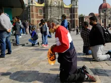 Faithful pray at the Basilica of Our Lady of Guadalupe in Mexico City.