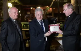Dale Recinella (C) accepts the Pontifical Academy for Life's Guardian of Life Award from Archbishop Vincenzo Paglia (L) and Cardinal Wim Eijk (R), Sept. 28, 2021. PAL screenshot