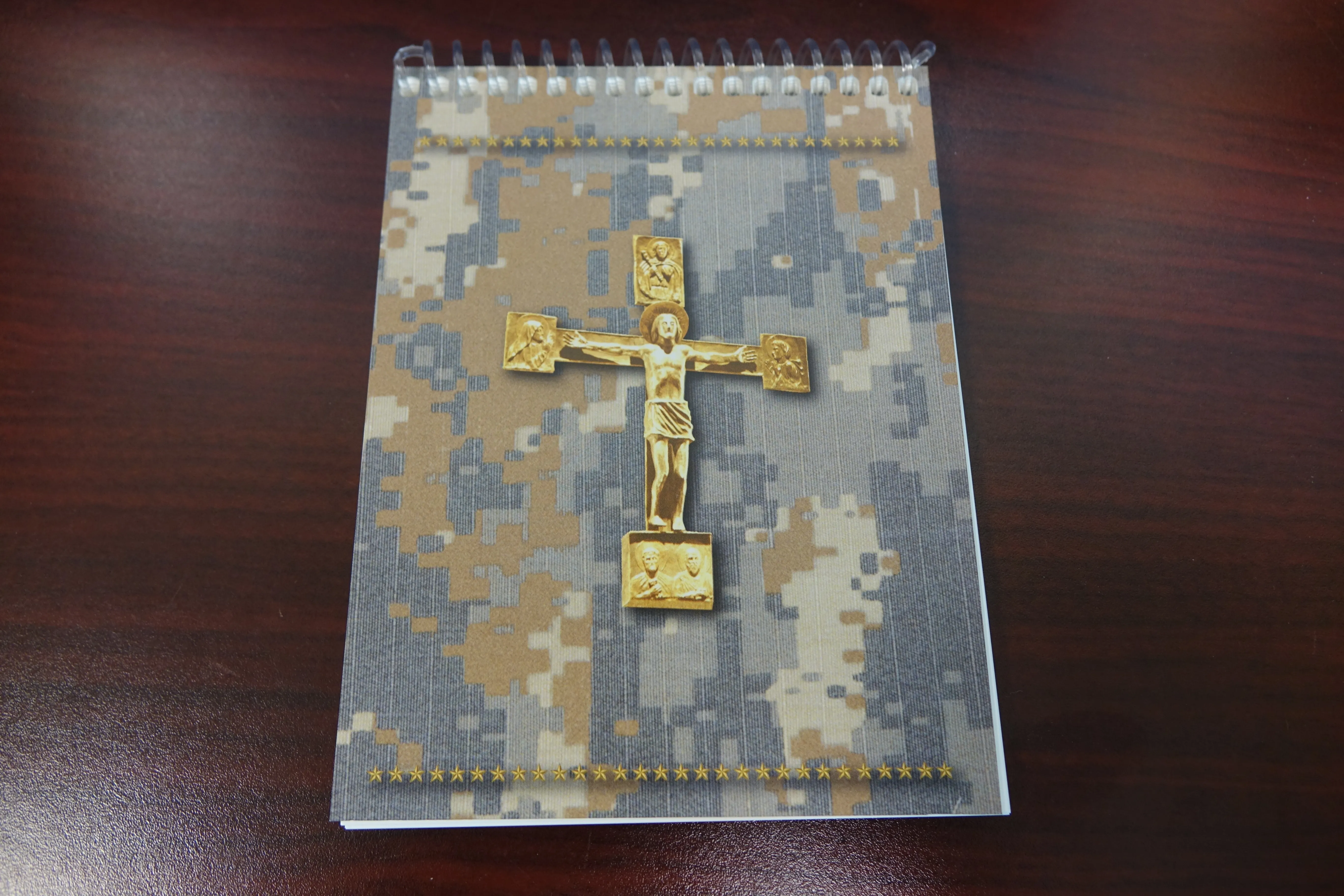 The latest edition of "Armed with the Faith: A Catholic Handbook for Military Personnel," is designed to hold up in arduous conditions, "with features including waterproof and tear-resistant stock, and plastic binders that enable the turning of pages without a sound.”. Courtesy of the Archdiocese for the Military Services