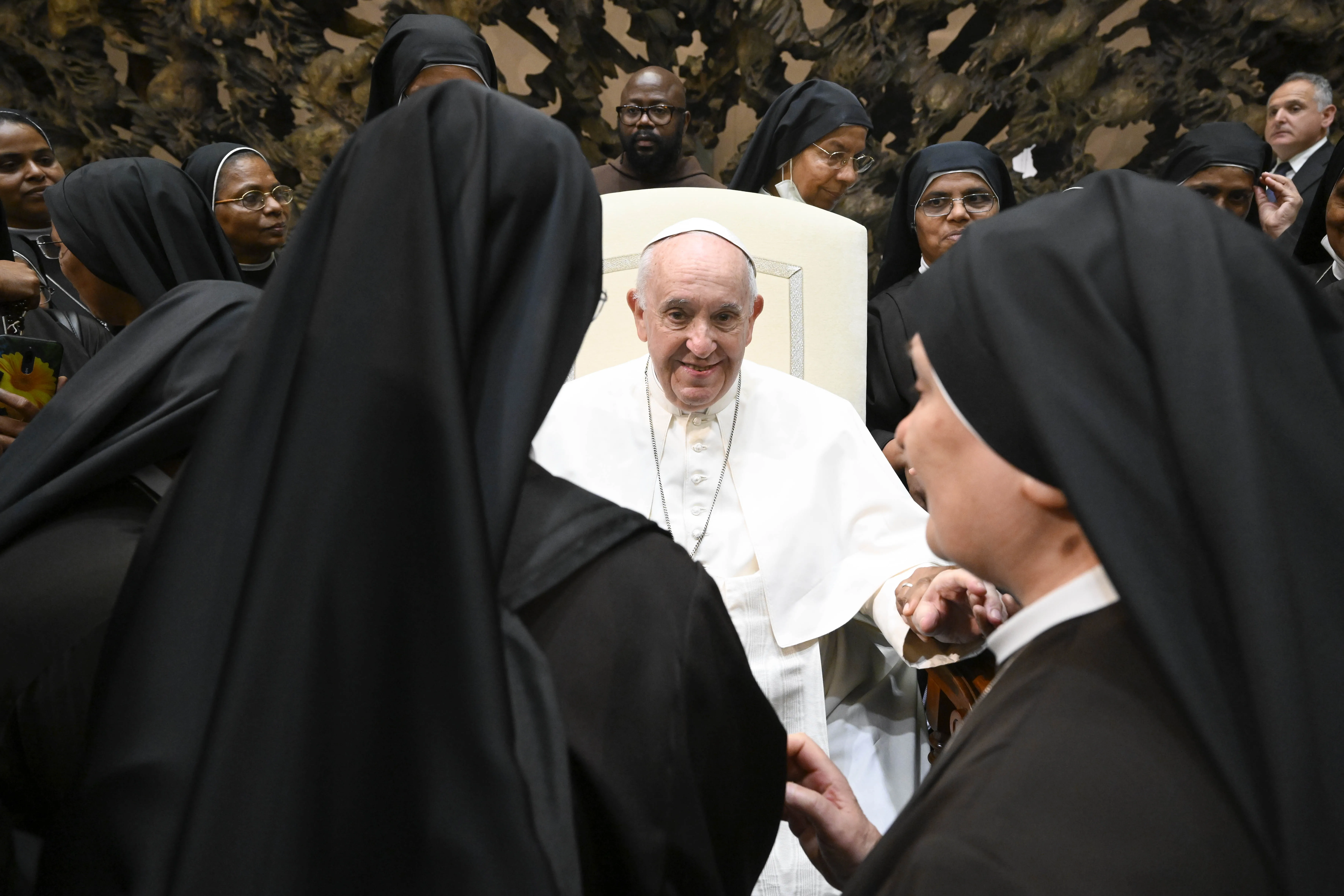 Pope Francis greets religious sisters at the end of his general audience on Aug. 10, 2022.?w=200&h=150