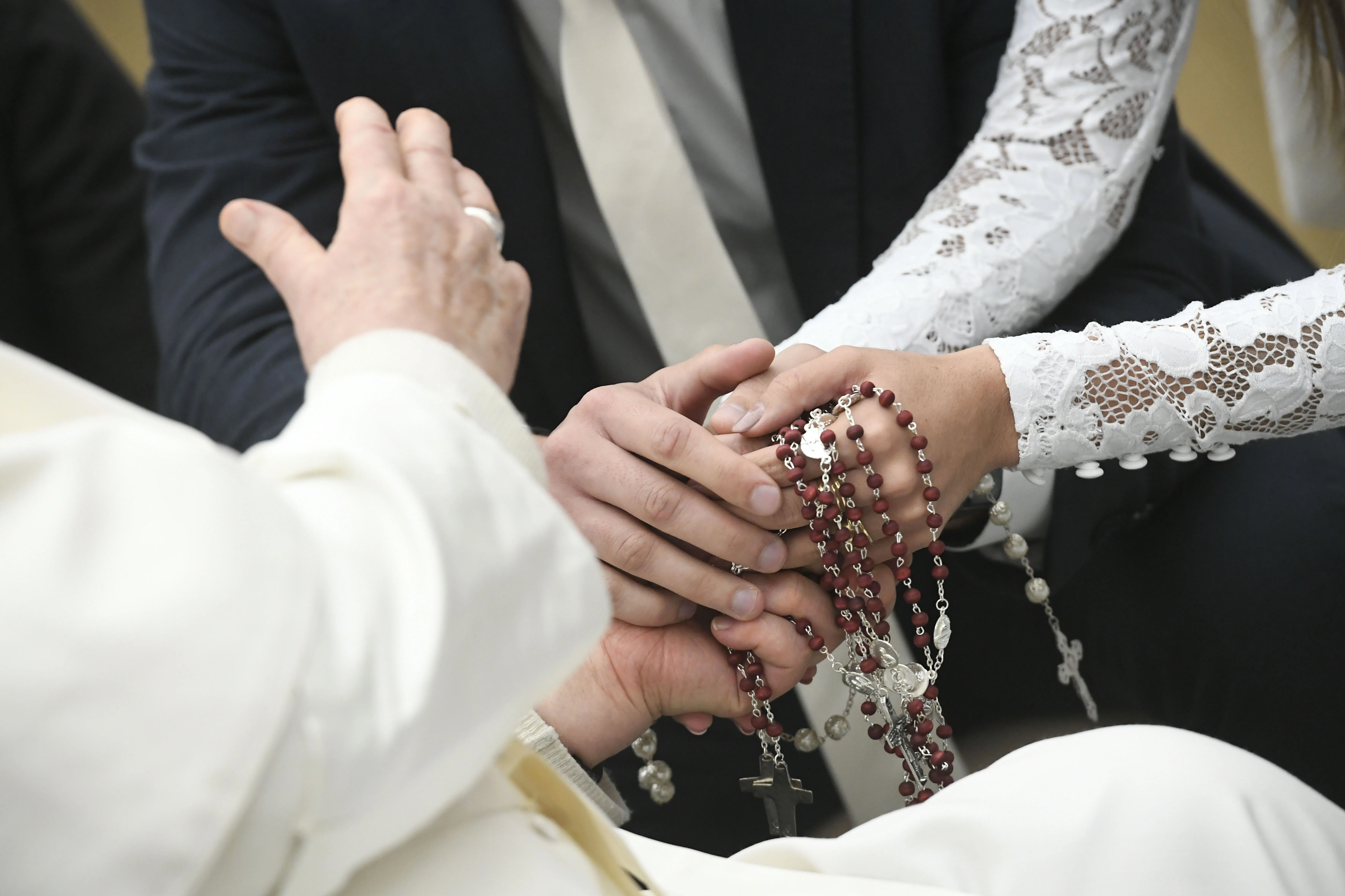 Pope Francis blesses a newly married couple during his general audience on Wednesday, Jan. 17, 2024, in the Paul VI Audience Hall at the Vatican. Credit: Vatican Media
