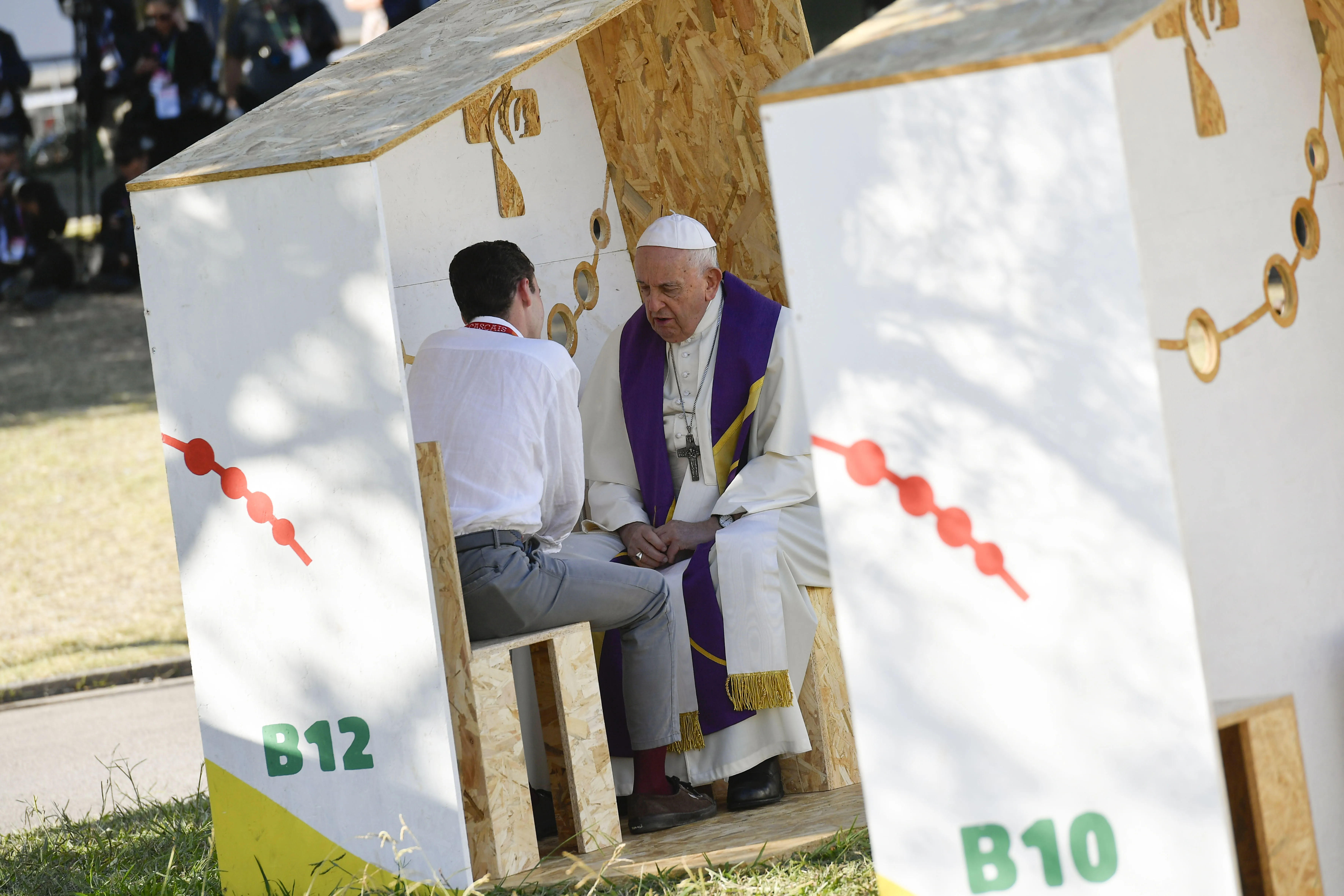 Pope Francis hears the confession of a young pilgrim at World Youth Day in Lisbon, Portugal, Aug. 4, 2023. Credit: Vatican Media