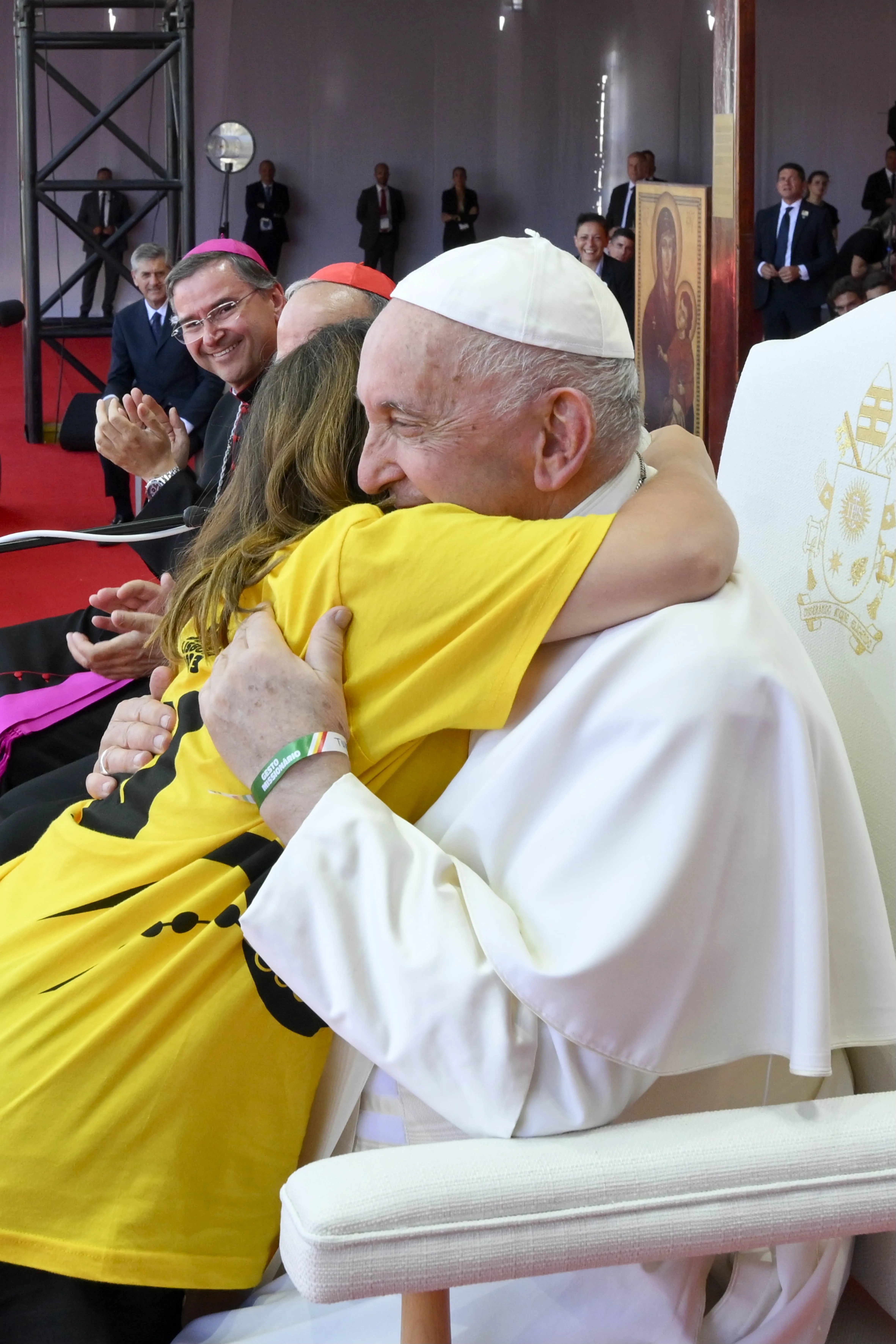 Pope Francis embraces  WYD2023 volunteer after closing Mass in Lisbon, Aug 6, 2023. Photo credit: Vatican Media