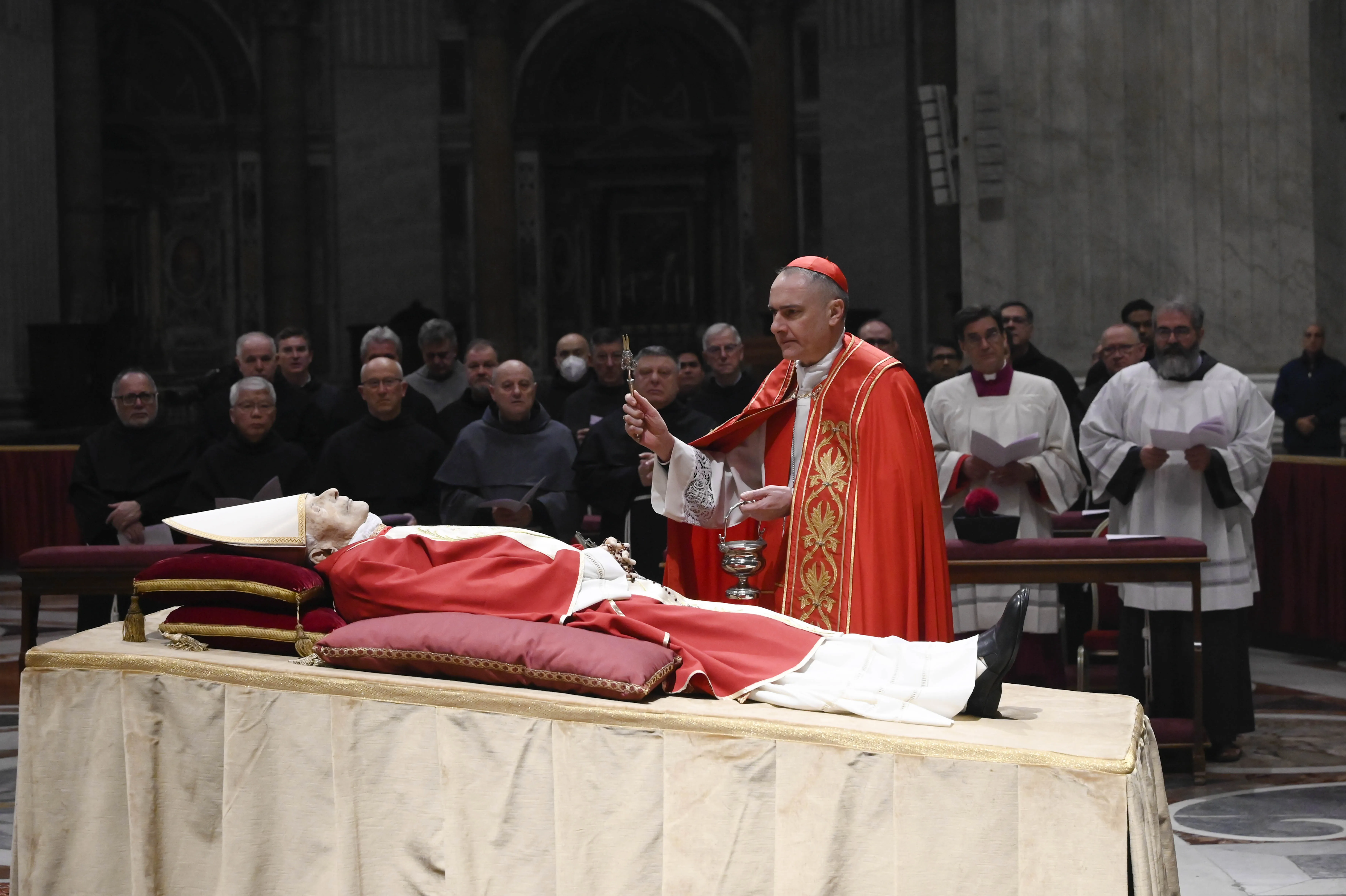 Cardinal Mauro Gambetti, the archpriest of St. Peter’s Basilica, presided over a brief ritual upon the arrival of Benedict XVI’s body in St. Peter's Basilica on Jan. 2, 2023, sprinkling the body with holy water and offering prayers for the repose of his soul. . Vatican Media