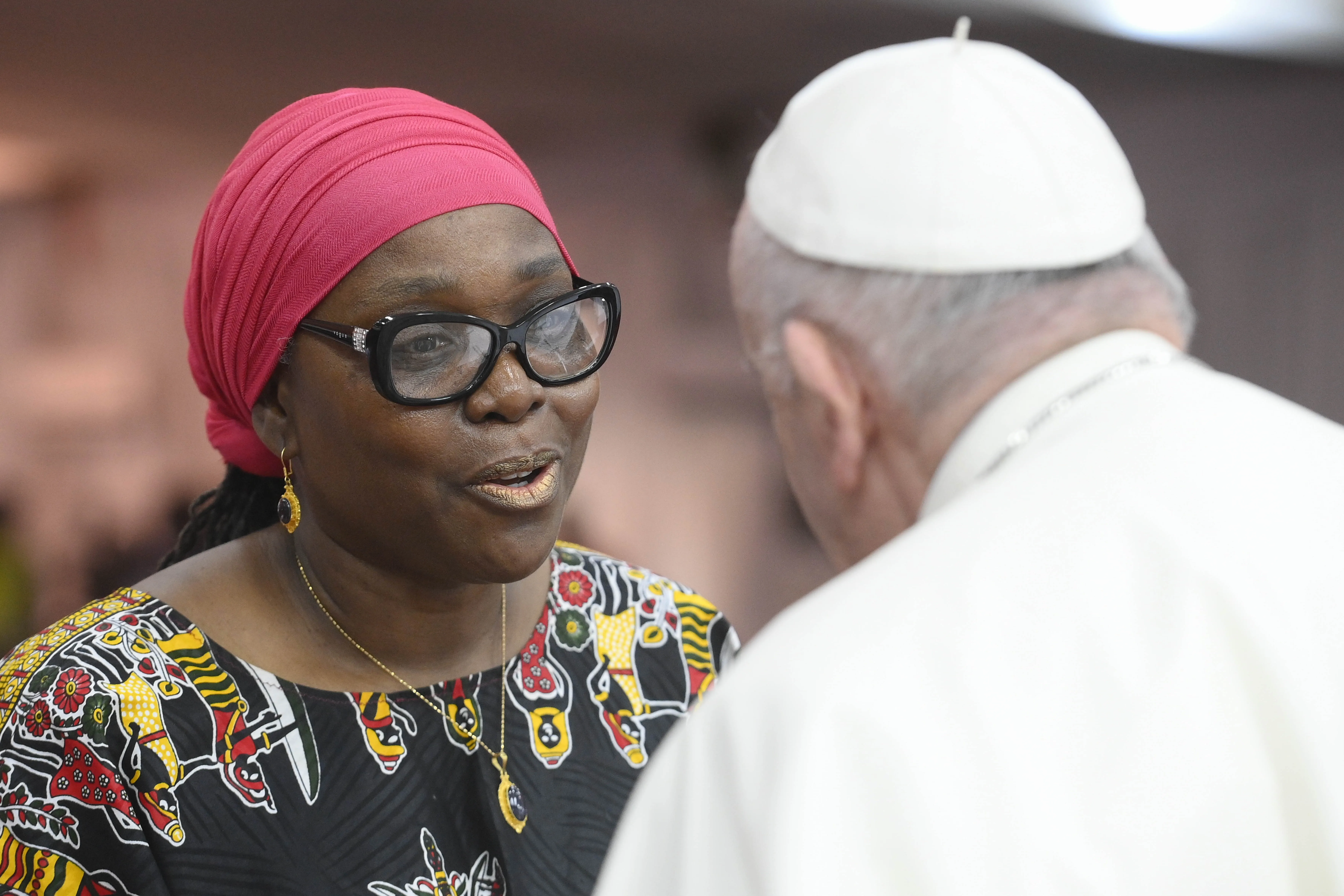 Pope Francis greets Sara Beysolow Nyanti, a representative of the United Nations Mission in South Sudan, during a gathering with 2,500 internally displaced persons in Juba, South Sudan, on Feb. 4, 2023. Vatican Media