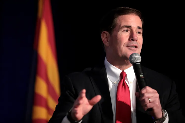 Arizona Gov. Doug Ducey, who has signed a law barring abortions based on non-fatal genetic disorders, speaks at an awards luncheon in Scottsdale, Ariz., June 17, 2019. Credit: Gage Skidmore via Flickr (CC BY-SA 2.0)