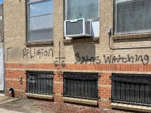 F*** religion,' 'Satans watching,' '666,' and an upside down cross were drawn on the side of Annunciation Catholic School in Denver in June.
