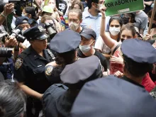 Hundreds of pro-abortion demonstrators tried to block a monthly pro-life march and prayer vigil at a Planned Parenthood abortion clinic in Lower Manhattan on July 2, 2022, setting off a tense confrontation.