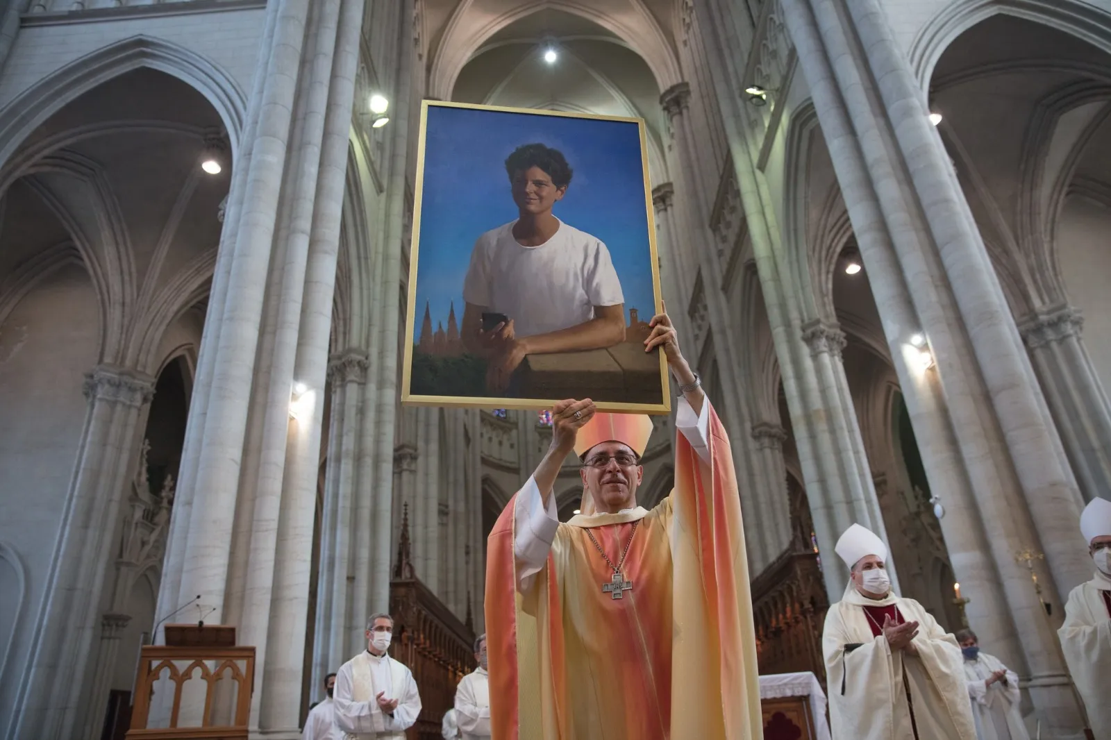Cardinal-elect Víctor Manuel Fernández, shown holding aloft an image of Blessed Carlo Acutis, says he promoted eucharistic adoration, Bible studies, the rosary, and youth prayer groups as a priest and bishop in Argentina. Credit: Courtesy of the Archdiocese of La Plata