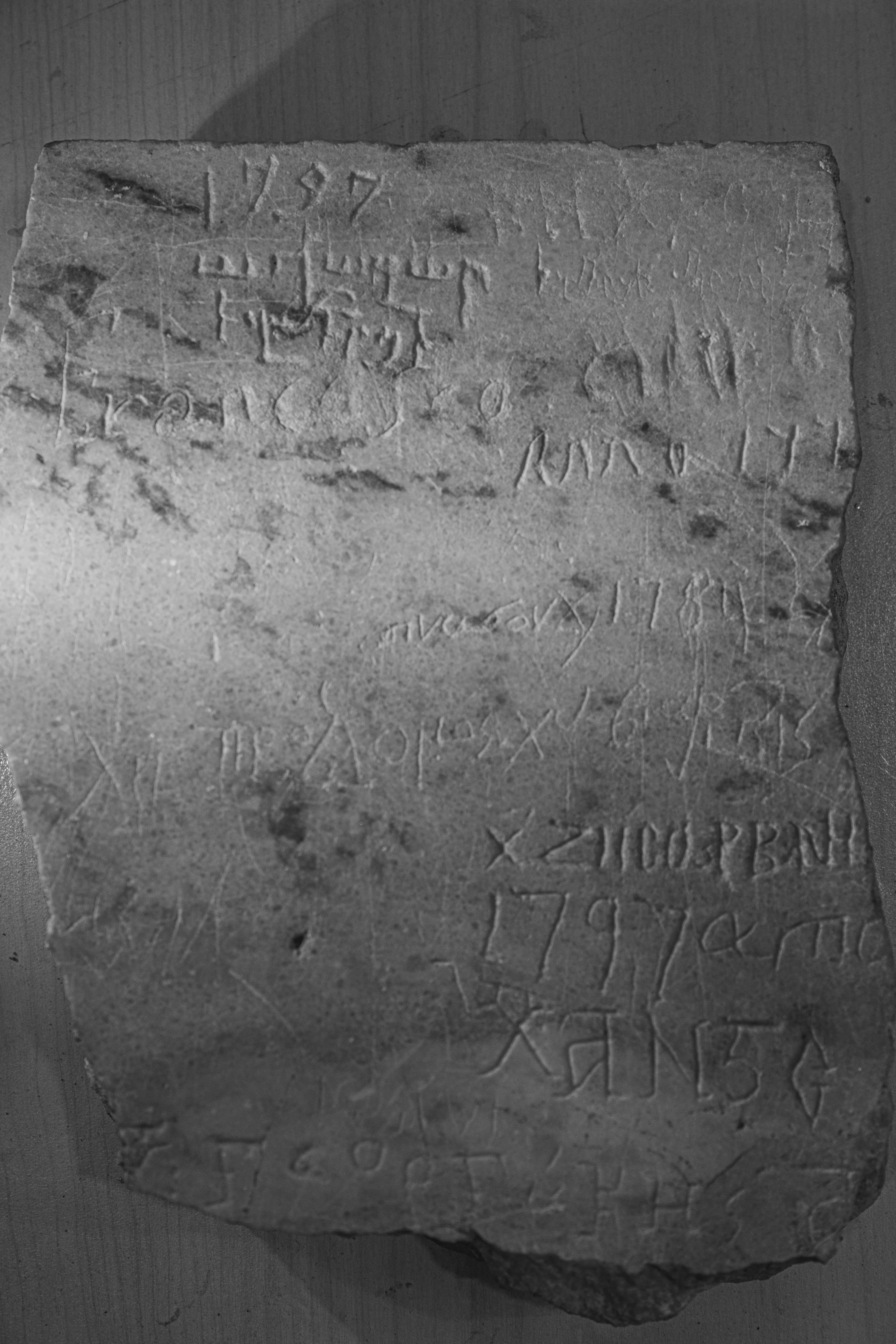 Inscriptions by pilgrims in Latin, Greek, and Armenian (18th century) uncovered during excavations at Basilica of Holy Sepulcher in Jerusalem. Credit: Gianfranco Pinto Ostuni