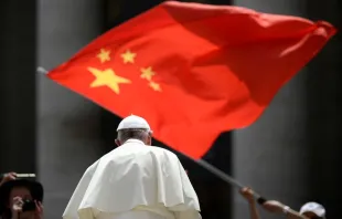 A worshiper waves the flag of China as Pope Francis leaves following the weekly general audience on June 12, 2019, at St. Peter's square in the Vatican. Photo by FILIPPO MONTEFORTE/AFP via Getty Images