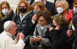 Pope Francis meets a group of women at the end of his weekly general audience at the Paul VI hall in the Vatican on March 2, 2022. Photo by VINCENZO PINTO/AFP via Getty Images