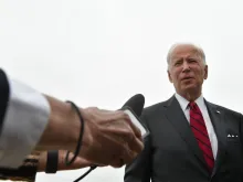 US President Joe Biden speaks to members of the press prior to boarding Air Force One at Joint Base Andrews in Maryland, May 3, 2022.