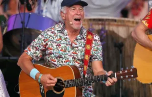 Multiplatinum-selling music legend Jimmy Buffett performs with the Broadway cast of the new musical “Escape to Margaritaville” at the 2018 A Capitol Fourth at the U.S. Capitol, West Lawn, on July 4, 2018, in Washington, D.C. Credit: Paul Morigi/Getty Images for Capital Concerts Inc.