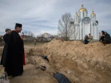 Major Archbishop Sviatoslav Shevchuk prays on April 7, 2022, for Ukrainians killed by Russian forces in Bucha.