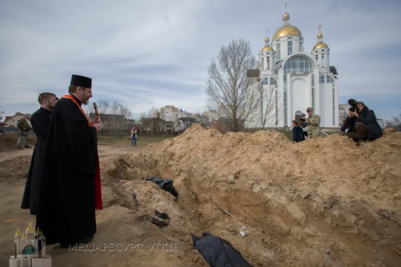 His Beatitude Sviatoslav Shevchuk prays on April 7, 2022, for Ukrainians killed by Russian forces in Bucha. 