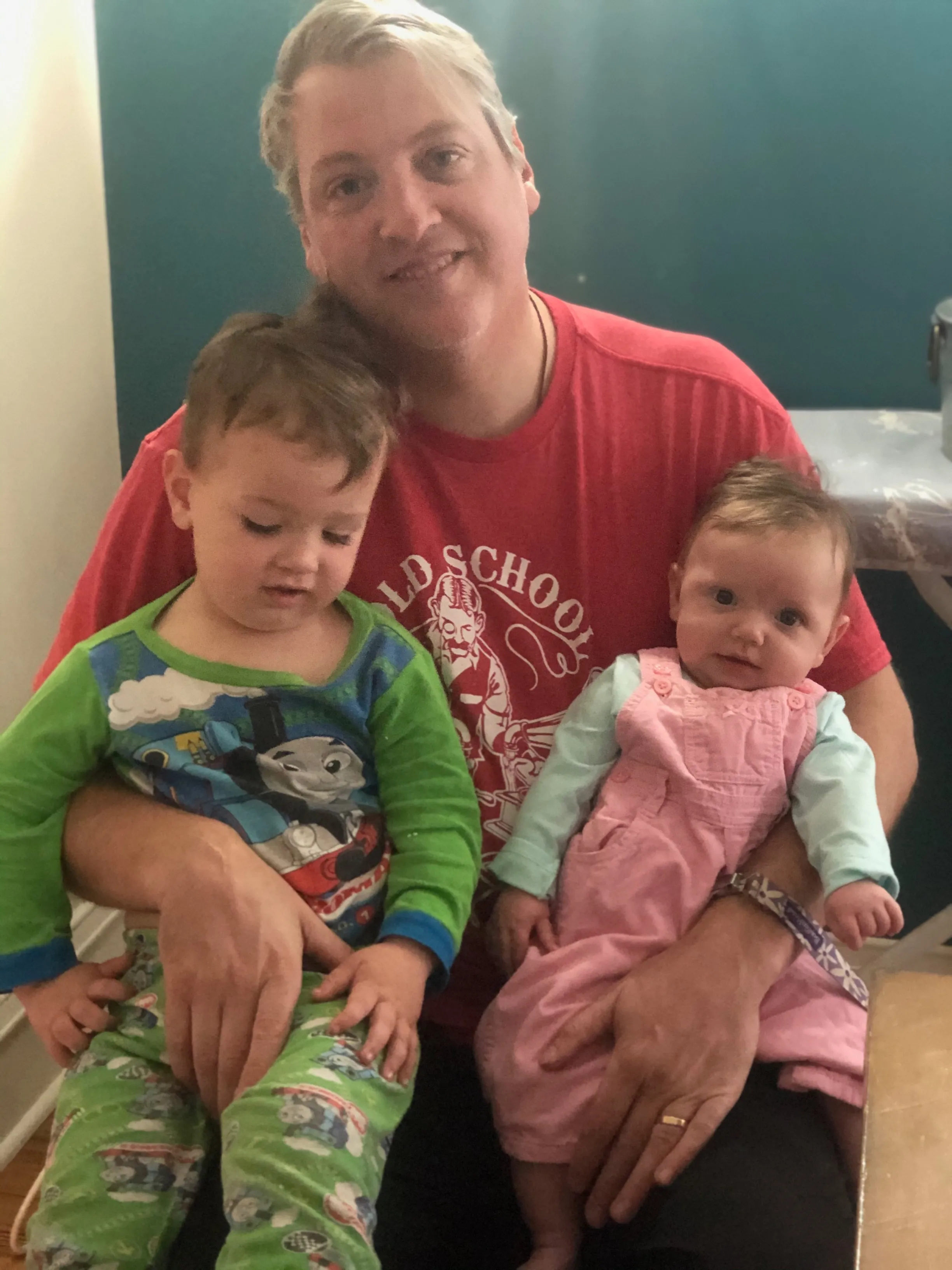 Mark Houck with two of his seven children. Courtesy of the Houck family