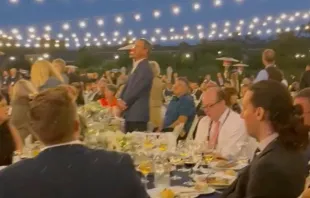 Attendees at a gathering sponsored by the Napa Institute sing the "Salve Regina" to drone out protesters who demonstrated at the Meritage Resort and Spa in Napa, California, on July 30, 2022. Screenshot from Chris Stefanick video
