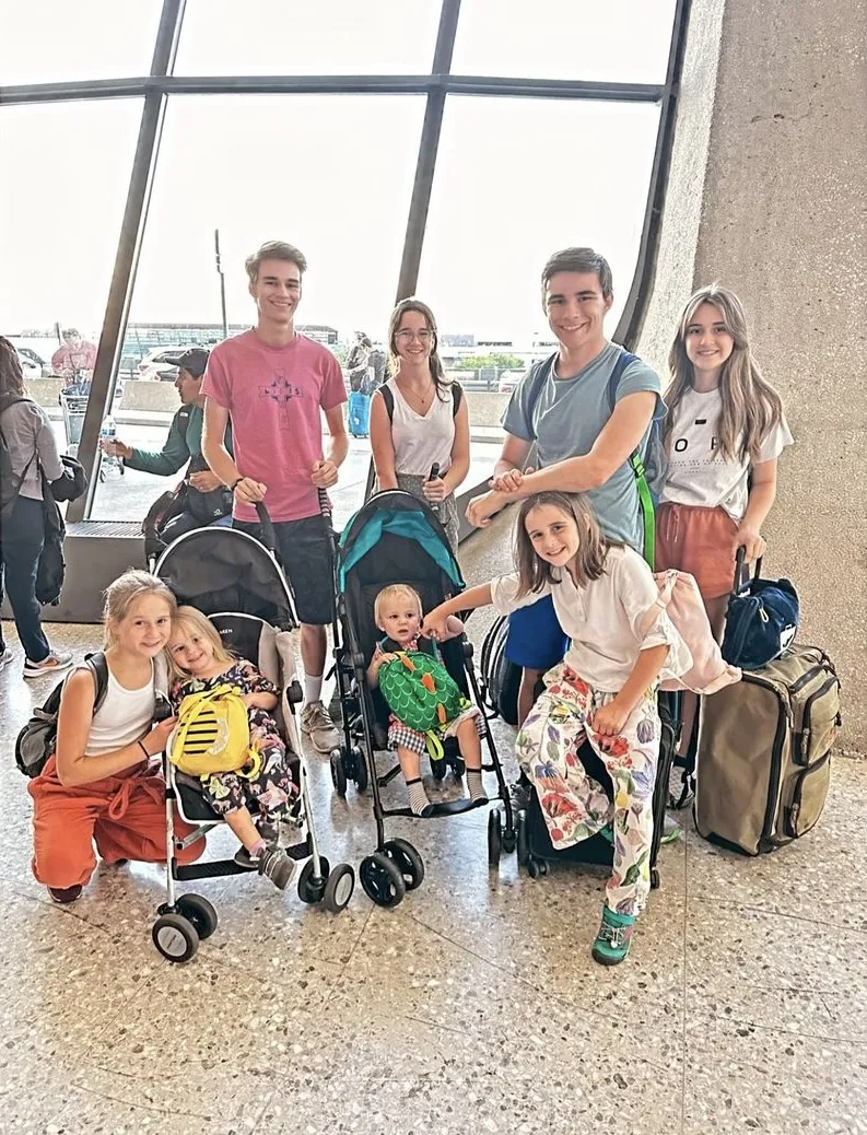 The Love family at the airport on their way to World Youth Day 2023 in Lisbon, Portugal. Photo credit: Alexis Love