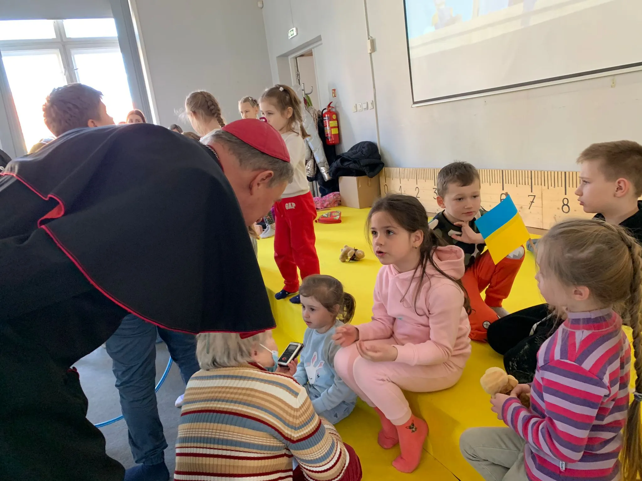 Archbishop Stankevičs greets the children. Archdiocese of Riga