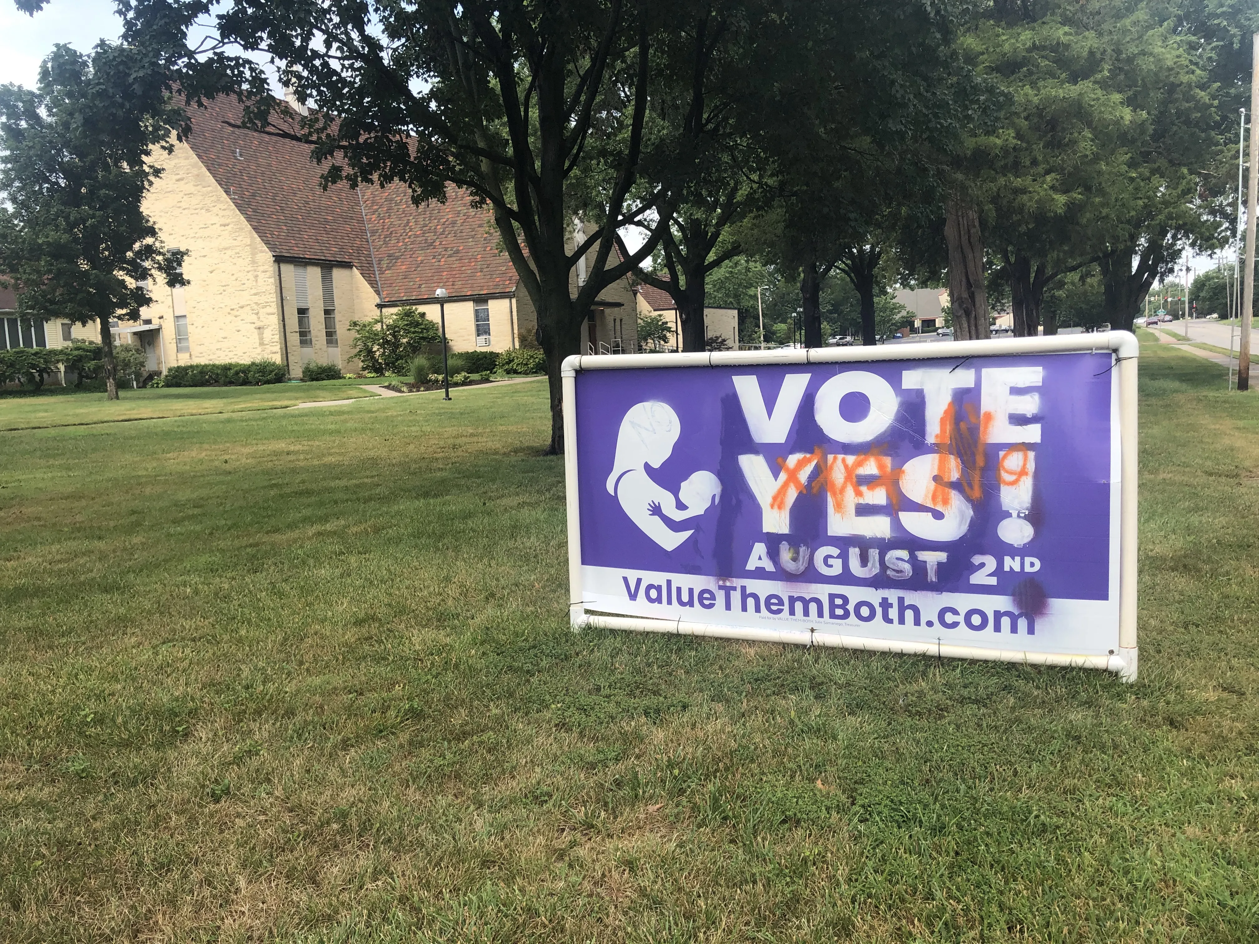 A defaced sign in favor of the Value Them Both amendment outside Most Pure Heart of Mary parish in Topeka, Kan., July 27, 2022. Carl Bunderson/CNA