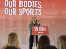 Madisan DeBos, a Division I track and cross country student-athlete at Southern Utah University, speaks at the "Our Bodies, Our Sports" rally in Washington, D.C., on June 23, 2022.