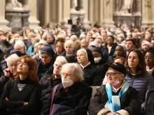 Catholics attending a special Mass for Pope Emeritus Benedict XVI at the Lateran Basilica in Rome, Dec. 30, 2022.