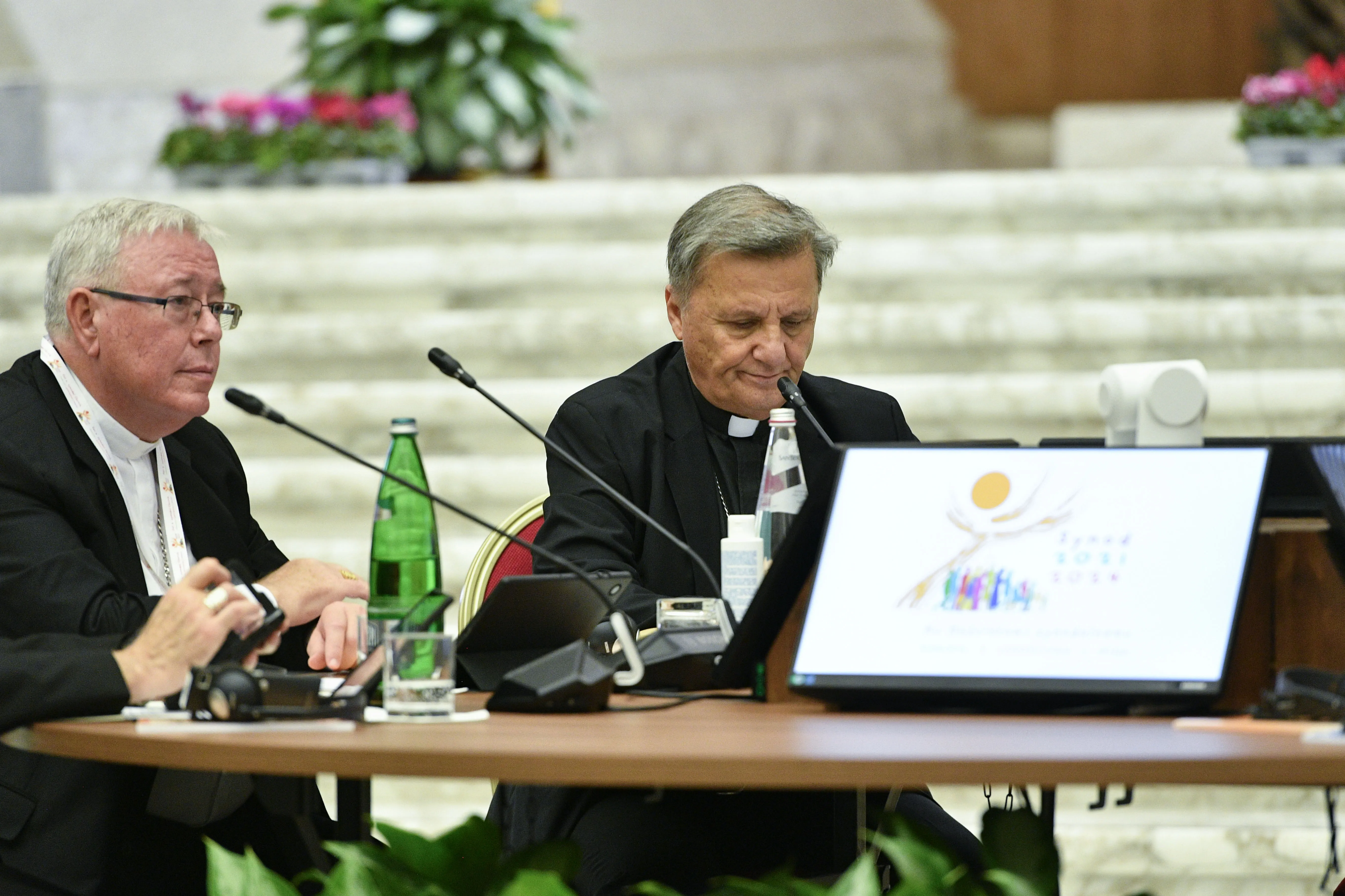 Cardinal Jean-Claude Hollerich (left), relator general of the Synod on Synodality, and Cardinal Mario Grech, secretary general of the Synod, at the Oct. 9, 2023, general congregation. Credit: Vatican Media