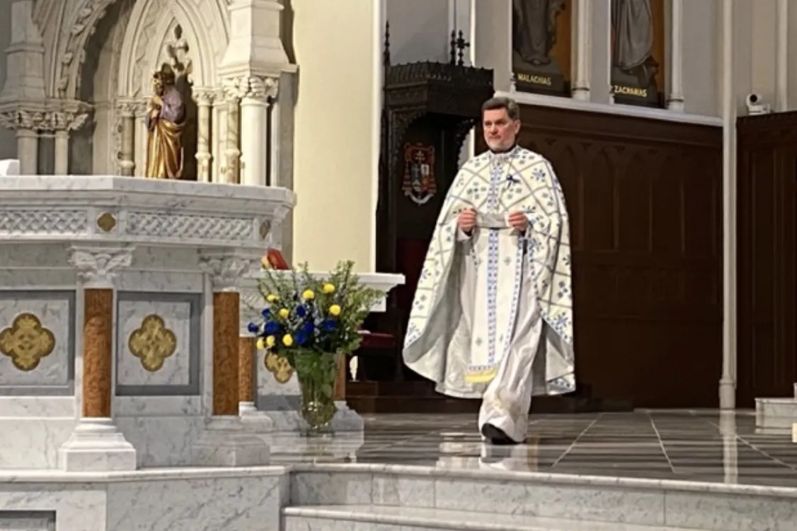 Father Yaroslav Nalysnyk, pastor of Christ the King Ukrainian Catholic Church in Boston, approaches the ambo during a March 25, 2022 Mass at Holy Cross Cathedral in Boston. Joe Bukuras/CNA