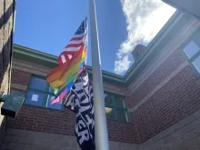 American, gay pride, and BLM flags being flown at Nativity School of Worcester in Worcester, Mass.