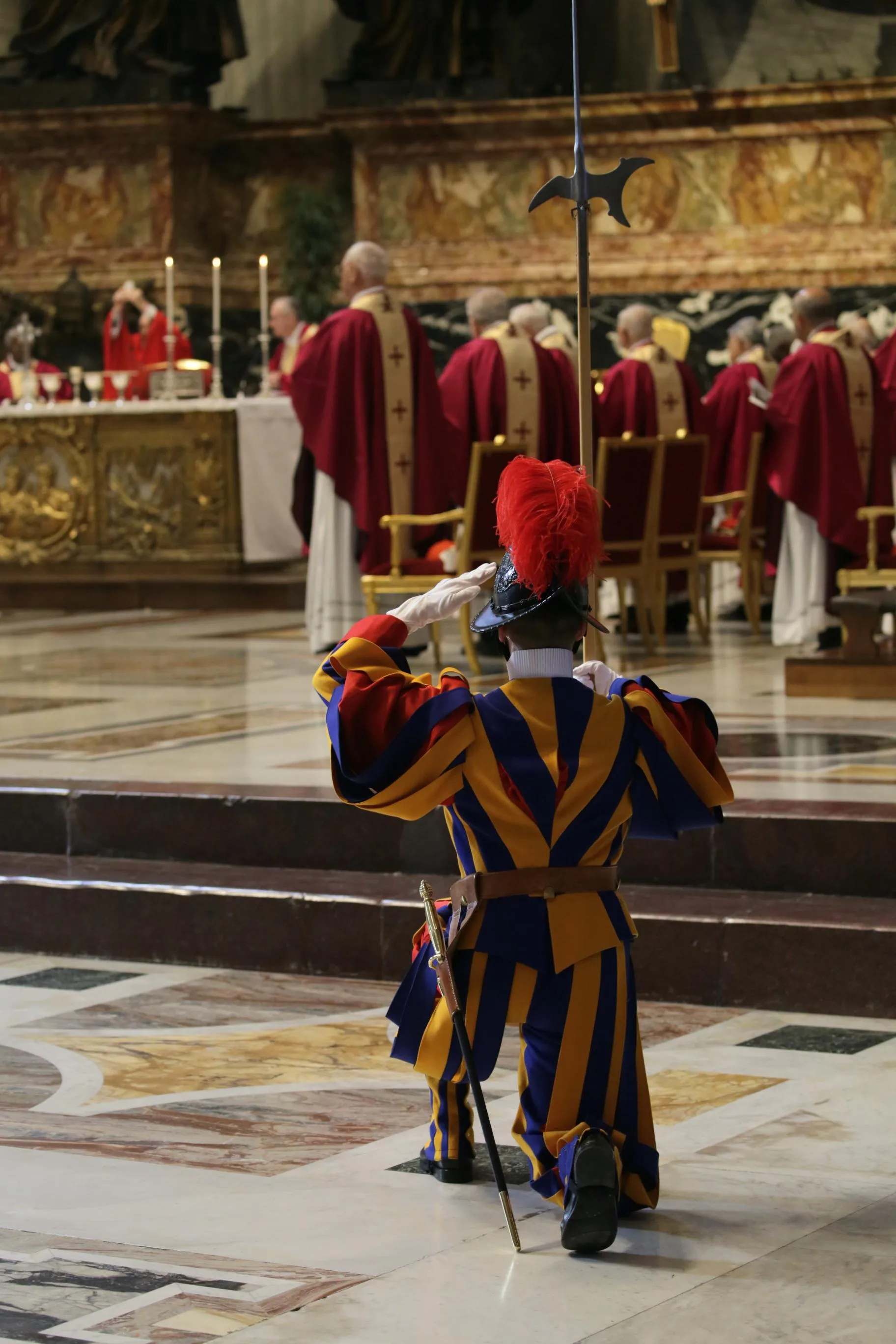 A Swiss Guard genuflects during the consecration at Cardinal George Pell's funeral Mass on Jan. 14, 2023. Alan Koppschall/CNA