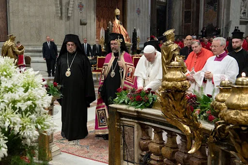 Pope Francis and the delegation from the Ecumenical Patriarchate of Constantinople pray before St. Peter’s tomb, June 29, 2022. Vatican Media