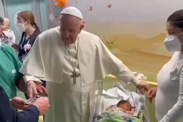 Pope Francis baptizes