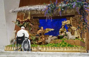 Pope Francis spent time in silent prayer in front of a nativity scene handmade by artisan craftsmen in Guatemala on Dec. 3, 2022. Photo courtesy of the Embassy of Guatemala to the Holy See