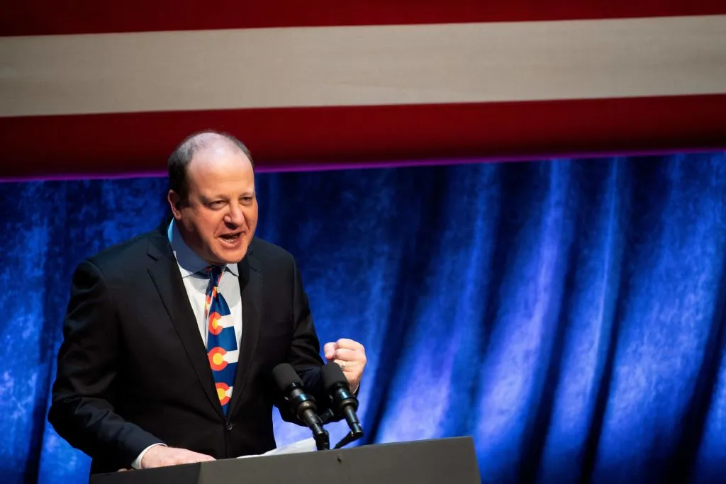 Colorado Gov. Jared Polis introduces U.S. Vice President Kamala Harris, not pictured, at the start of a climate crisis event at the Arvada Center for Performing Arts in Arvada, Colorado, on March 6, 2023.?w=200&h=150