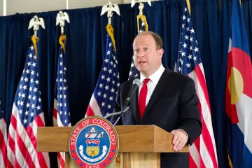 Colorado governor Jared Polis speaks at a press conference, June 11, 2020.