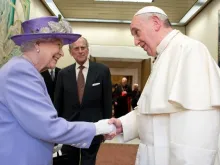 Queen Elizabeth greets Pope Francis at the Vatican in 2014.