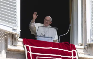 Pope Francis waves from a window of the Apostolic Palace during his Angelus address and prayer on Aug. 20, 2023. Vatican Media.